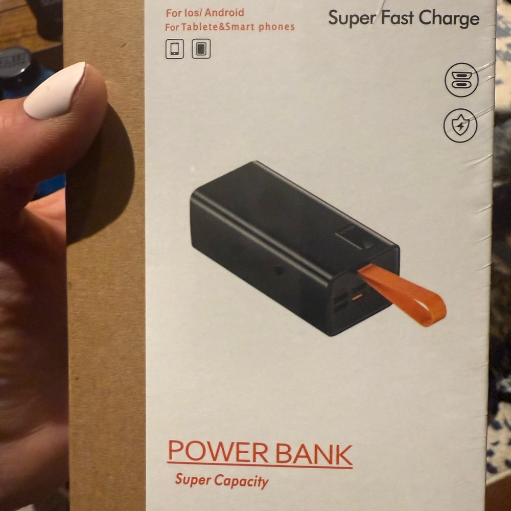Very Fast Power Bank Charger in Black with Orange Strap for carrying